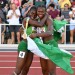 Women's 100m hurdles gold medallist Nigeria's Tobi Amusan (L) hugs women's long jump silver medallist Nigeria's Ese Brume during the World Athletics Championships at Hayward Field in Eugene, Oregon on July 24, 2022. (Photo by ANDREJ ISAKOVIC / AFP) (Photo by ANDREJ ISAKOVIC/AFP via Getty Images)