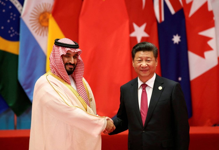 FILE PHOTO: Chinese President Xi Jinping shakes hands with Saudi Arabia's Deputy Crown Prince Mohammed bin Salman during the G20 Summit in Hangzhou, Zhejiang province, China September 4, 2016. REUTERS/Damir Sagolj/File Photo