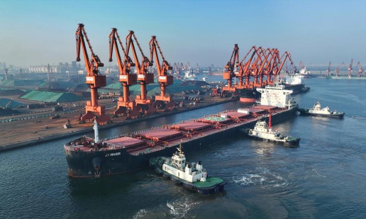 (230720) -- TANGSHAN, July 20, 2023 (Xinhua) -- This aerial photo taken on July 19, 2023 shows a ship berthing at a cargo terminal of Tangshan Port in Tangshan, north China's Hebei Province. The foreign trade cargo throughput in Tangshan Port reached 160.95 million tonnes from January to June, up 28.8 percent year on year. (Xinhua/Yang Shiyao)