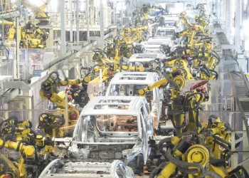 (240427) -- BEIJING, April 27, 2024 (Xinhua) -- Robots work at a welding workshop of Voyah, a Chinese electric auto brand, in Wuhan, central China's Hubei Province, April 1, 2024. With a burgeoning demand for clean energy solutions to combat climate change, the global landscape indicates a pressing need for expanded production capabilities rather than an excess.
   According to projections by the International Energy Agency, the demand for new energy vehicles is anticipated to skyrocket, reaching 45 million by 2030, 4.5 times that of 2022. (Xinhua/Xiao Yijiu)