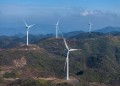 (240111) -- CHONGQING, Jan. 11, 2024 (Xinhua) -- An aerial drone photo taken on Jan. 10, 2024 shows wind turbines in Liutang Township of Shizhu Tujia Autonomous County, southwest China's Chongqing. The installed capacity of wind power and power generation from wind in Shizhu have reached 372,000 kW and 731 million kWh respectively. (Xinhua/Huang Wei)