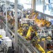 (240402) -- WUHAN, April 2, 2024 (Xinhua) -- A worker works at an assembly line of Voyah, a Chinese luxury electric auto brand, in Wuhan, central China's Hubei Province, April 1, 2024. In recent years, Wuhan enhanced its research ability on energy saving and carbon reduction technologies, aiming to upgrade the automobile industry with technological innovation. (Xinhua/Xiao Yijiu)