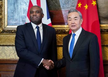 British Foreign Secretary David Lammy welcomes China's foreign affairs minister Wang Yi ahead of a meeting, in London, Britain. Picture date: Thursday February 13, 2025. James Manning/Pool via REUTERS
